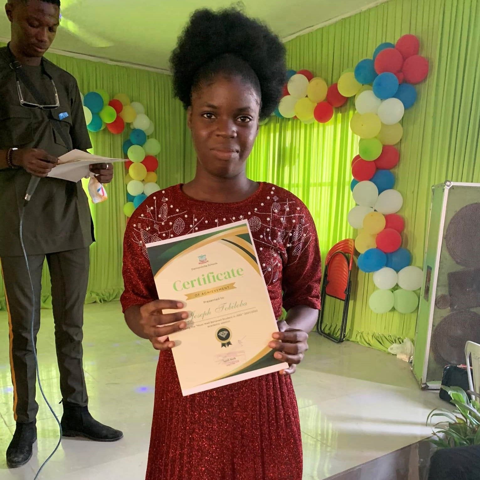 A Diamondville student receiving an achievement award